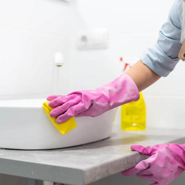 cleaning-cleaning-bathroom-sink-with-spray-deter-2025-10-10-11-52-02-utc